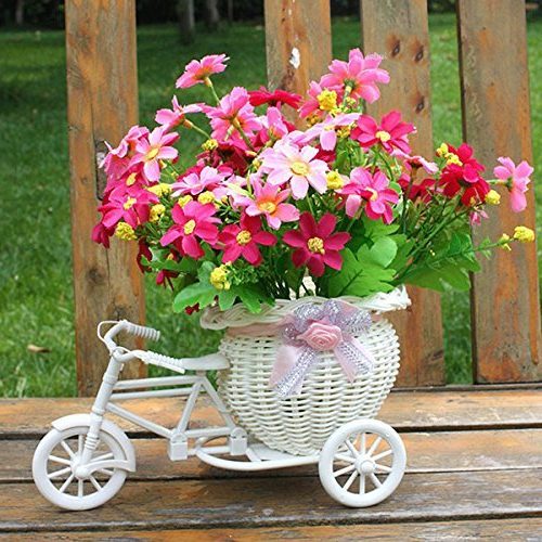 Triciclo con cesta de flores para decoración